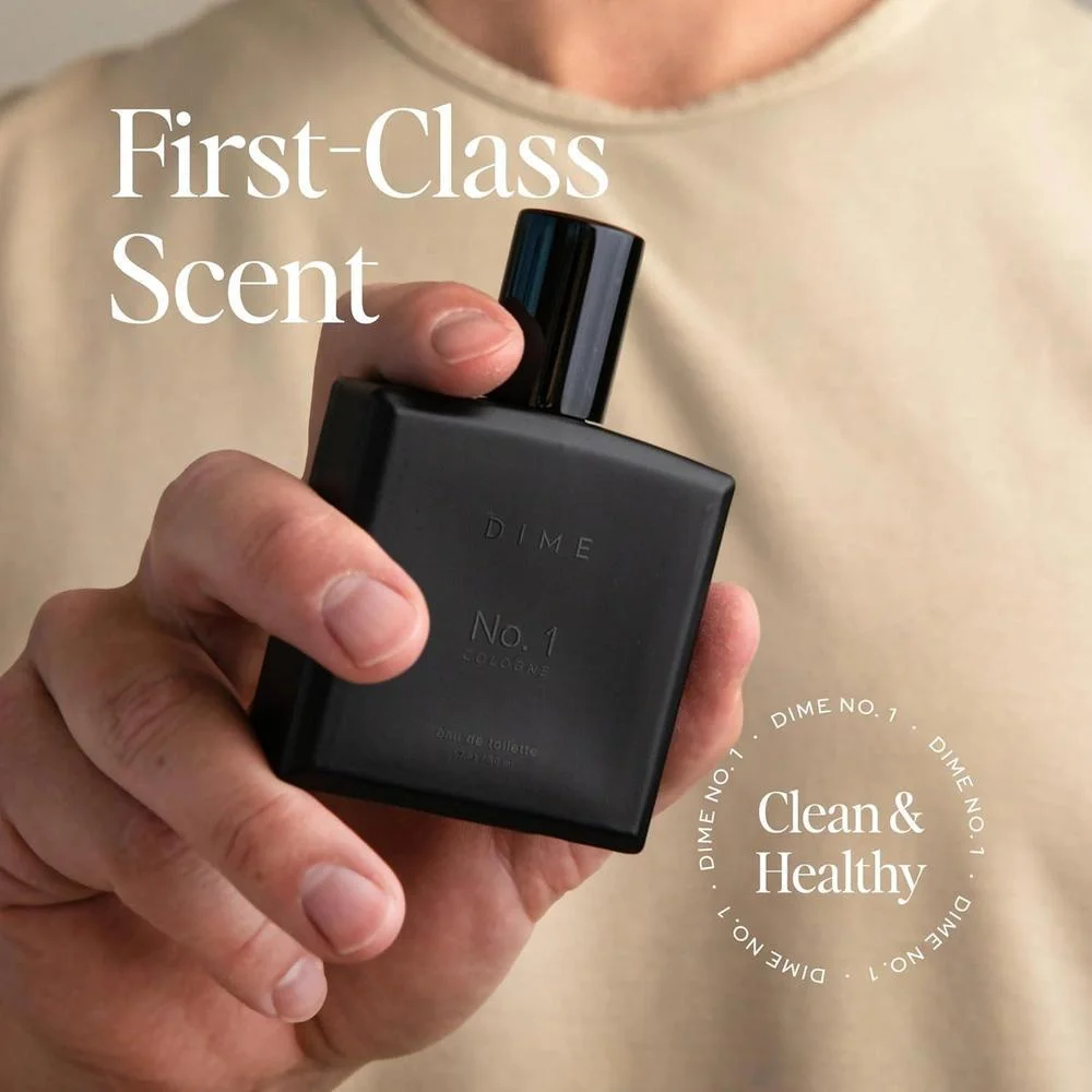 DIME Colonia No. 1 para hombres, con fragancia de maderas de ámbar, cardamomo y cuero. Ideal para uso diario o especial