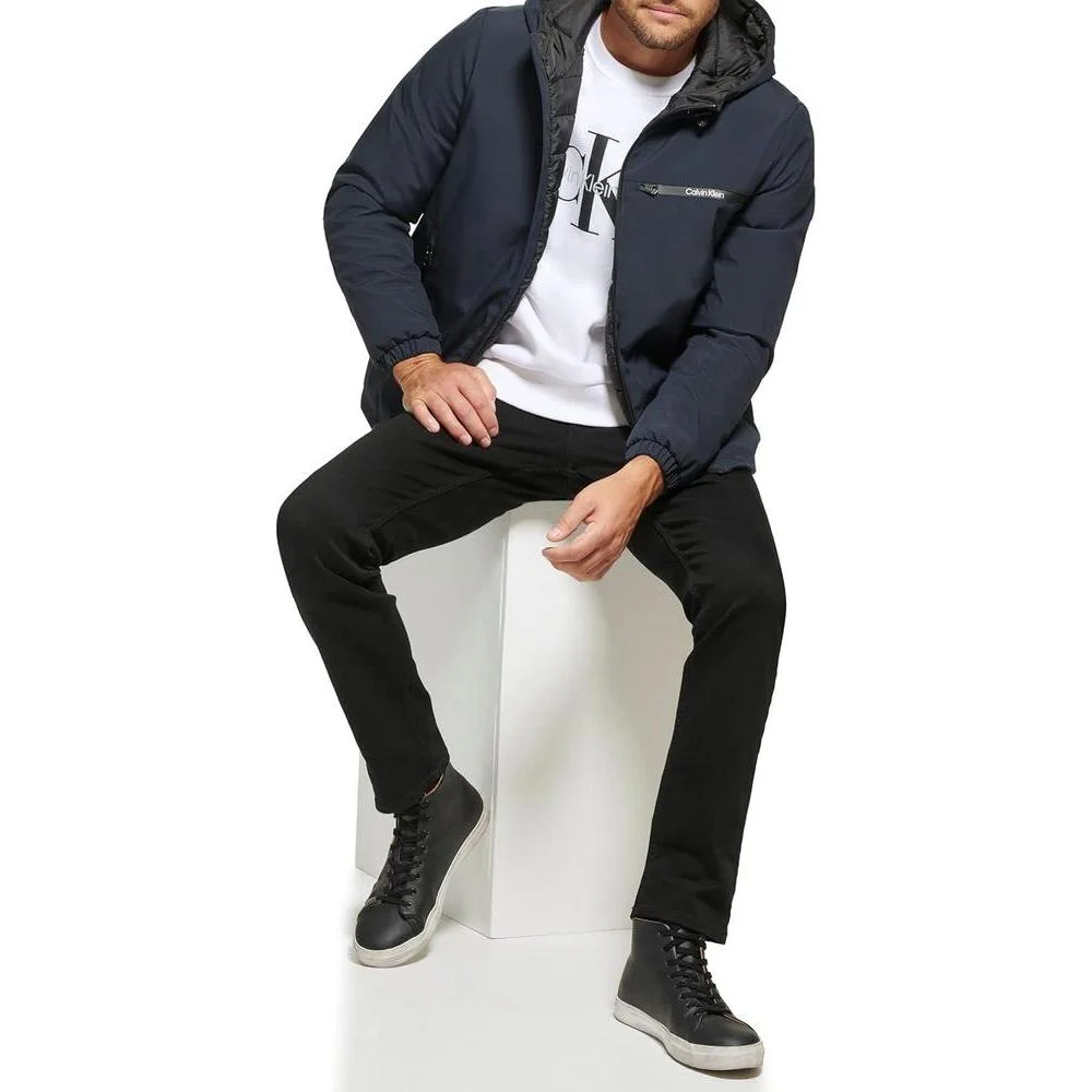 Chaqueta cortavientos de Calvin Klein para hombre con capucha, diseño versátil, resistente al agua y viento, ideal para clima frío