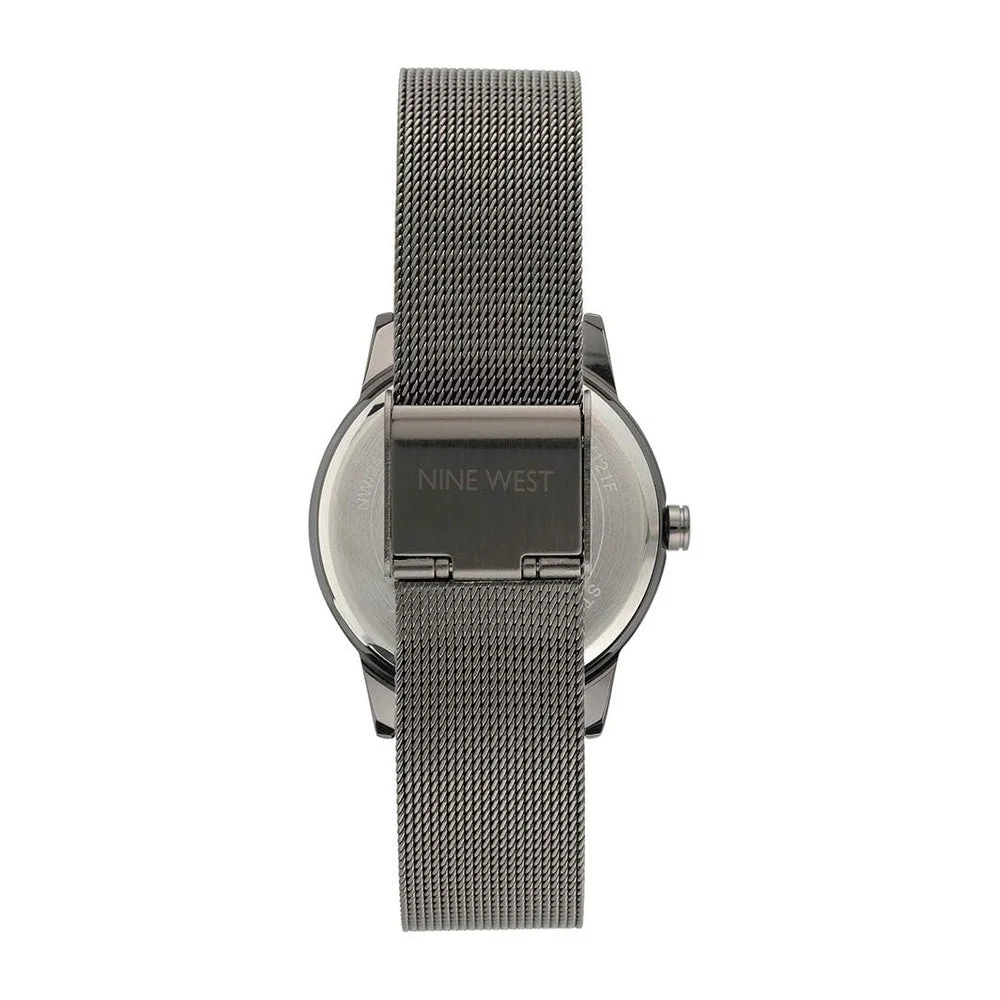 Reloj de pulsera para mujer Nine West con diseño floral, manecillas doradas, pulsera plateada, cristal resistente