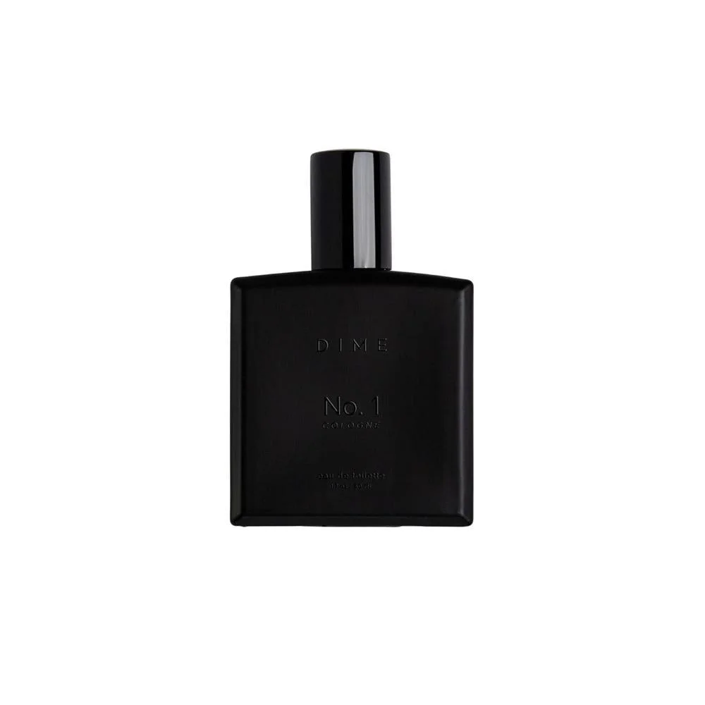 DIME Colonia No. 1 para hombres, con fragancia de maderas de ámbar, cardamomo y cuero. Ideal para uso diario o especial