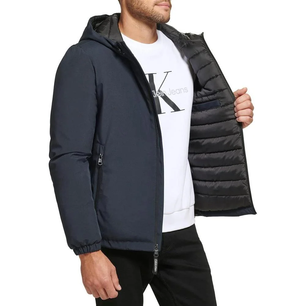Chaqueta cortavientos de Calvin Klein para hombre con capucha, diseño versátil, resistente al agua y viento, ideal para clima frío