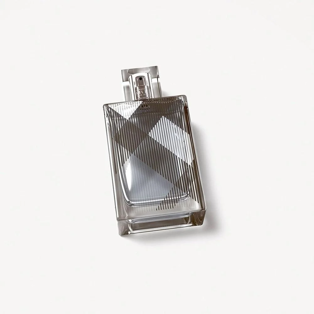 Burberry Brit Eau de Toilette Colonia Woody para hombre con notas de cedro, mandarina, rosa silvestre y haba tonka