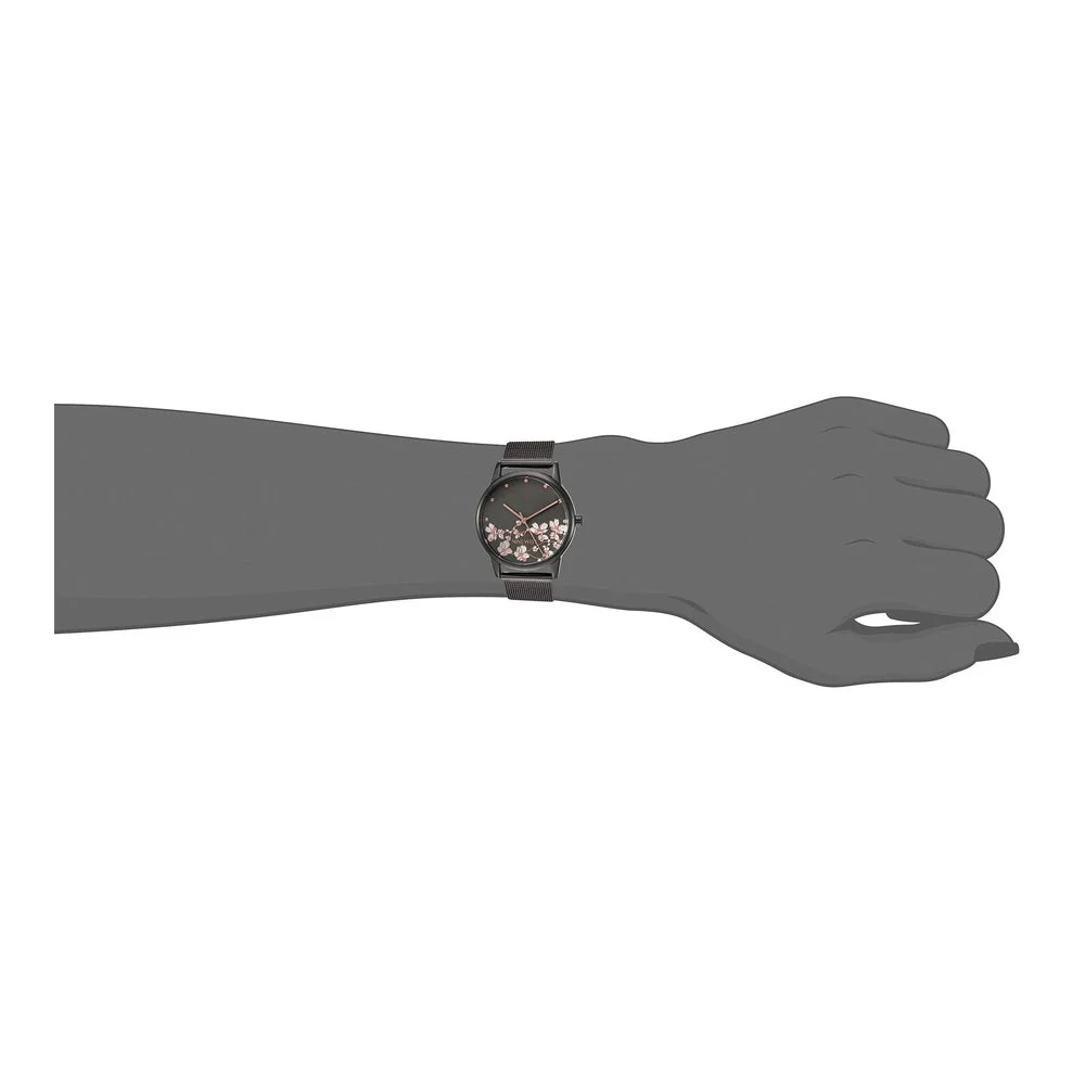 Reloj de pulsera para mujer Nine West con diseño floral, manecillas doradas, pulsera plateada, cristal resistente