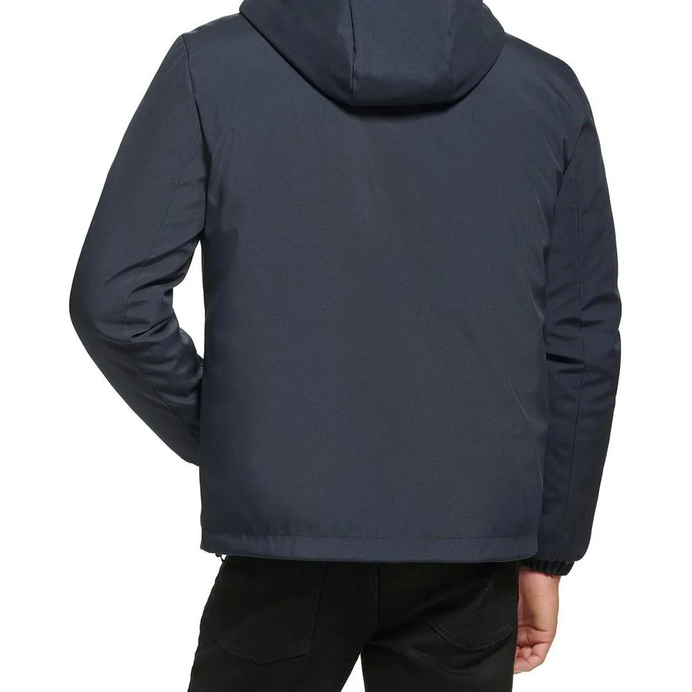 Chaqueta cortavientos de Calvin Klein para hombre con capucha, diseño versátil, resistente al agua y viento, ideal para clima frío